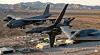 Drei US-Bomber B-52, B-1B Lancer und B-2 Spirit im Formationsflug über einer Wüstenbasis, strategische Luftverteidigung 2026.